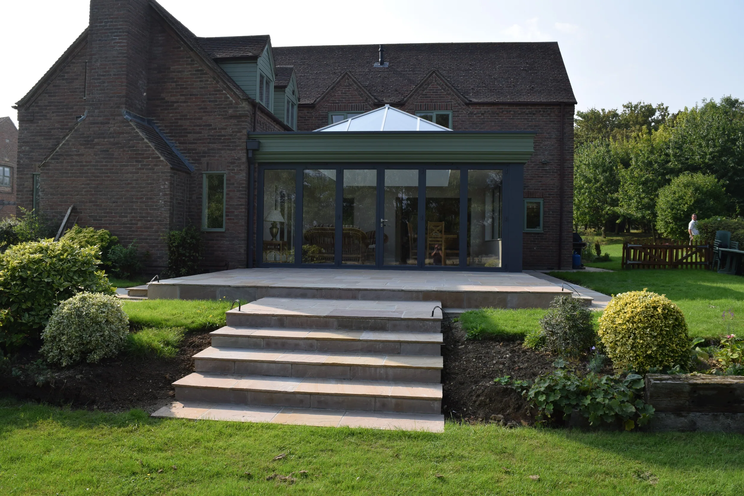 Completed Ablewood garden room with sandstone steps